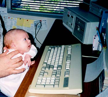 [Clara at the computer - three months old]